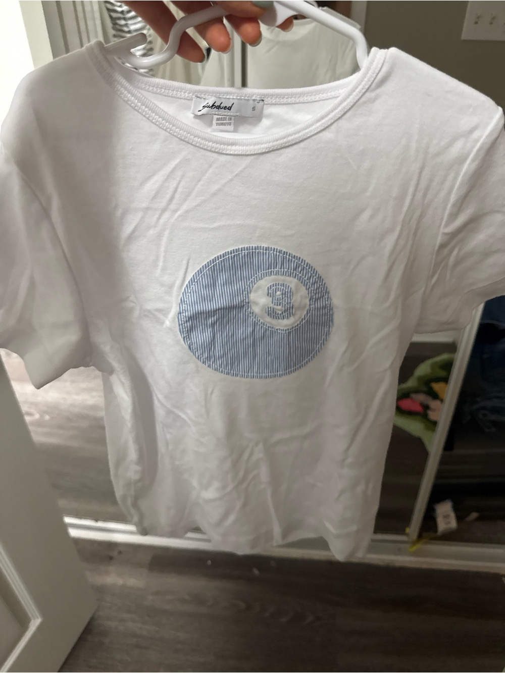 White Short Sleeve Tee with Blue Striped Circle Patch by Saltwater